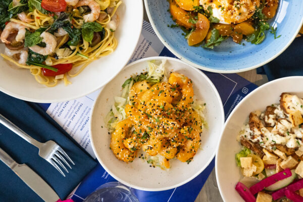 Bronte Boathouse waterfront restaurant food dishes on table shrimp pasta